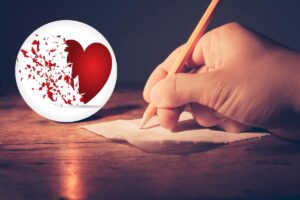 mano che scrive su un foglio- cuore